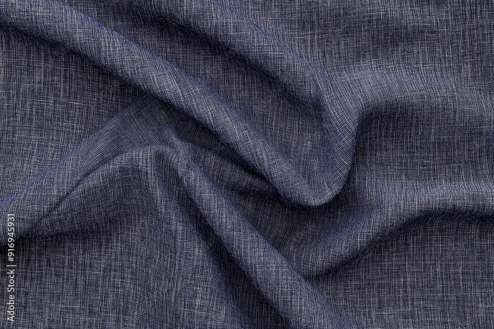 A close-up shot of dark blue fabric, highlighting its fine weave and subtle sheen in exquisite detail.. A close-up shot of dark blue fabric, highlighting its fine weave and subtle sheen in exquisite detail..