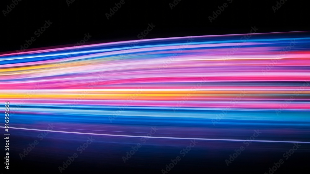 Colorful abstract light trails creating a vibrant display against a dark background Colorful abstract light trails creating a vibrant display against a dark background
