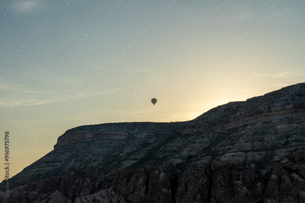 Obraz premium Hot air ballooning is a popular attraction in Cappadocia, Turkiye.