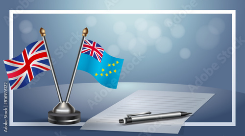 United Kingdom and Tuvalu Small national flag on bokeh background, cooperative relationship