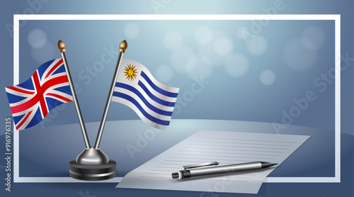 United Kingdom and Uruguay Small national flag on bokeh background, cooperative relationship