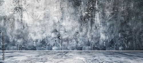 Copy space on a textured grungy grey wall ideal for displaying content or images