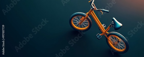 Orange bicycle on a dark blue background. photo