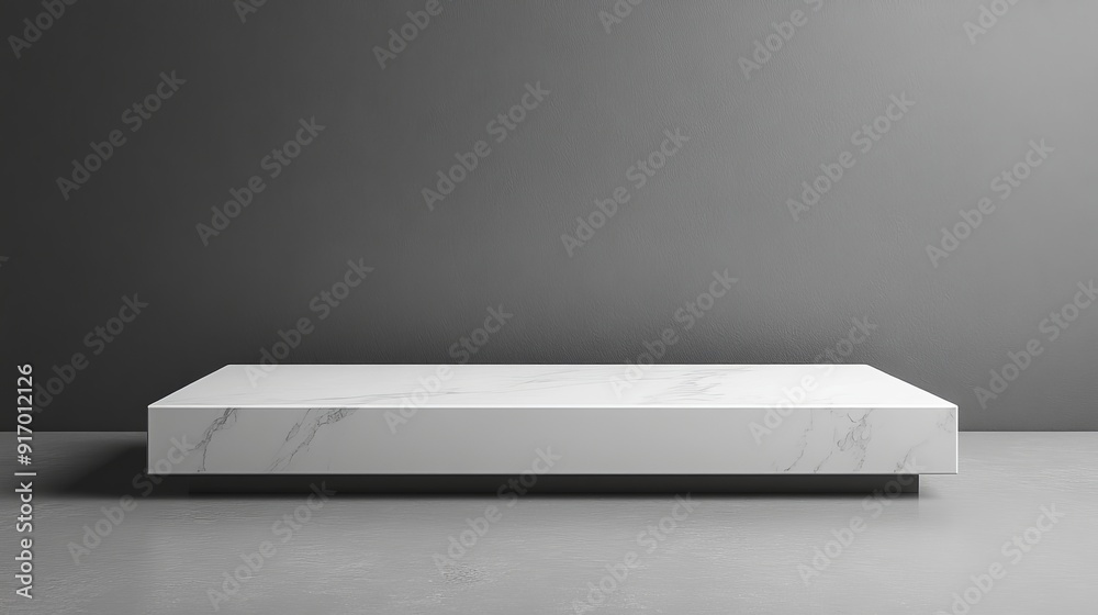 A white marble table is sitting in a room with a grey wall A white marble table is sitting in a room with a grey wall