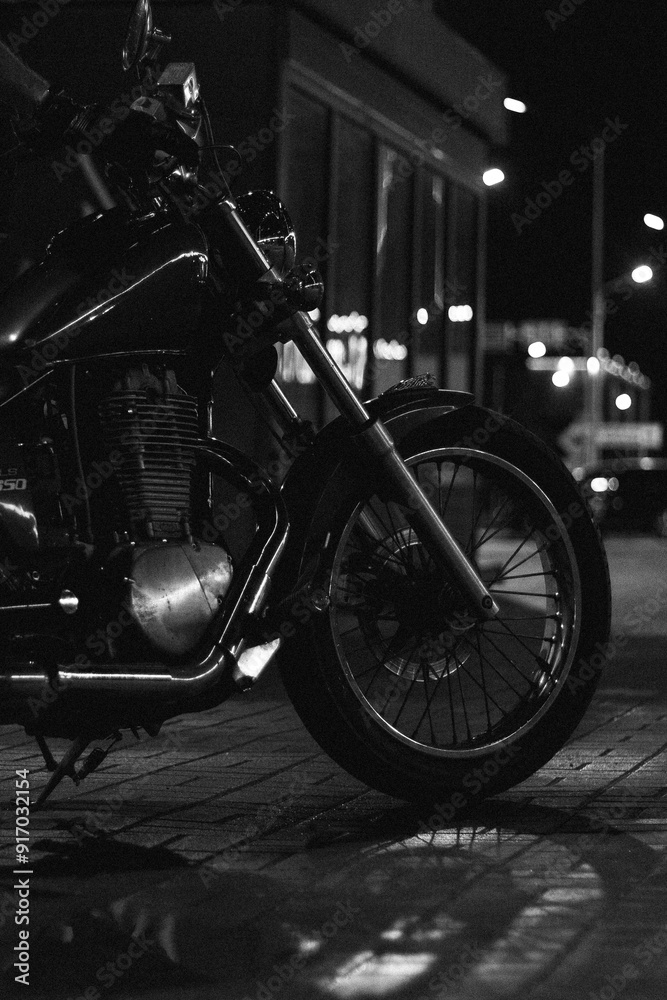red chopper motorcycle at night. bike in the rain red chopper motorcycle at night. bike in the rain