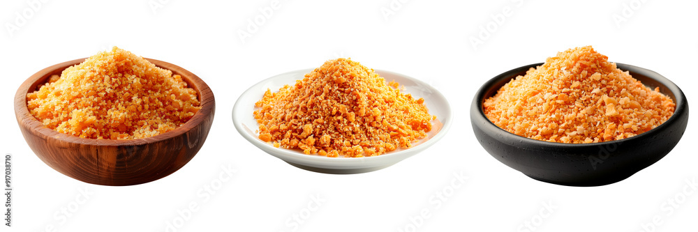 A set of breadcrumbs in a plate isolated on white or transparent background. Close-up breadcrumbs in a wooden, black and white plate, side view. Traditional spanish dish.