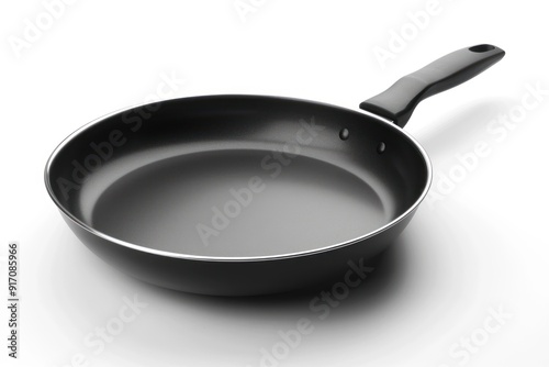 Black frying pan with handle isolated on white background.