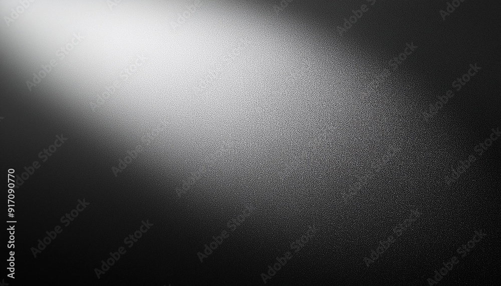 Soft Spotlight on Textured Black Surface. Gradual Transition from Dark to Light Gentle Illumination Effect with Fine, Subtle Grainy Details. Minimalist Aesthetic Soft Spotlight on Textured Black Surface. Gradual Transition from Dark to Light Gentle Illumination Effect with Fine, Subtle Grainy Details. Minimalist Aesthetic