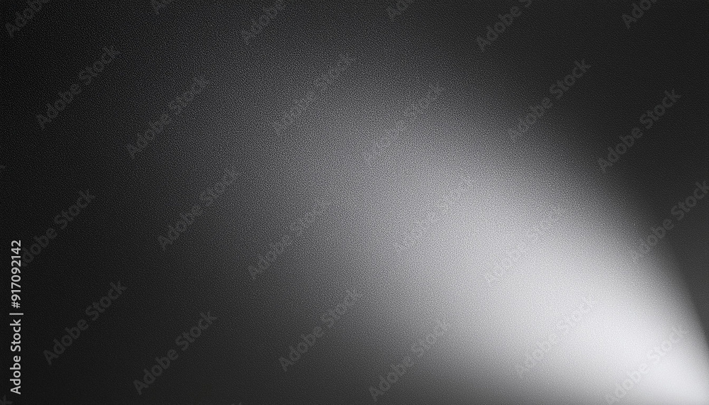 Soft Spotlight on Textured Black Surface. Gradual Transition from Dark to Light Gentle Illumination Effect with Fine, Subtle Grainy Details. Minimalist Aesthetic Soft Spotlight on Textured Black Surface. Gradual Transition from Dark to Light Gentle Illumination Effect with Fine, Subtle Grainy Details. Minimalist Aesthetic
