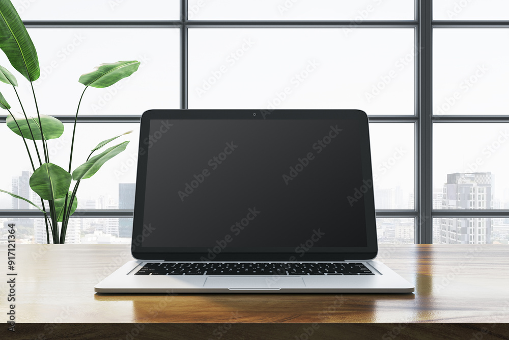 Modern laptop on wooden desk in front of large window with city view. 3D Rendering Modern laptop on wooden desk in front of large window with city view. 3D Rendering