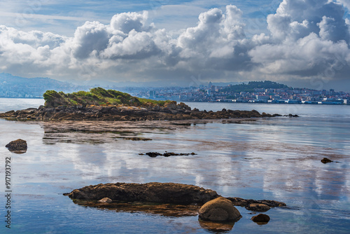 Islet of the Rats in Cangas de Morrazo with the city of Vigo on the other side of the estuary, Pontevedra.