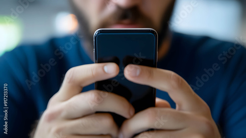 Social media scams concept. Close-up of a person’s face with a worried expression as they receive a social transaction notification on their smartphone