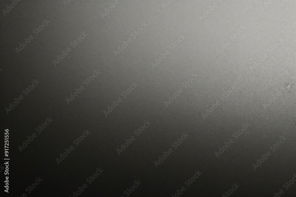 Black foil gradient texture background with uneven surface Black foil gradient texture background with uneven surface