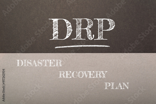 A chalkboard with the words Disaster Recovery Plan written on it photo