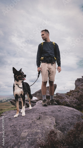Man with dog on rocks