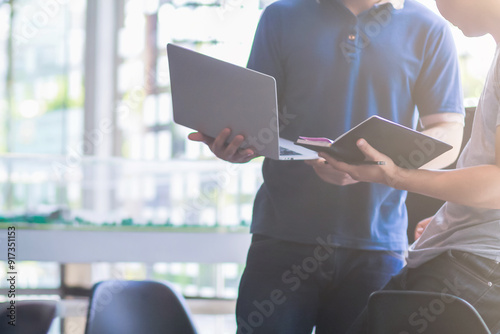 Startup entrepreneurs are talking to business consultants to study and calculate feasibility of investing business to get worthwhile return. ​​studying with investment consultant before doing business