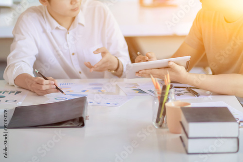Startup entrepreneurs are talking to business consultants to study and calculate feasibility of investing business to get worthwhile return. ​​studying with investment consultant before doing business
