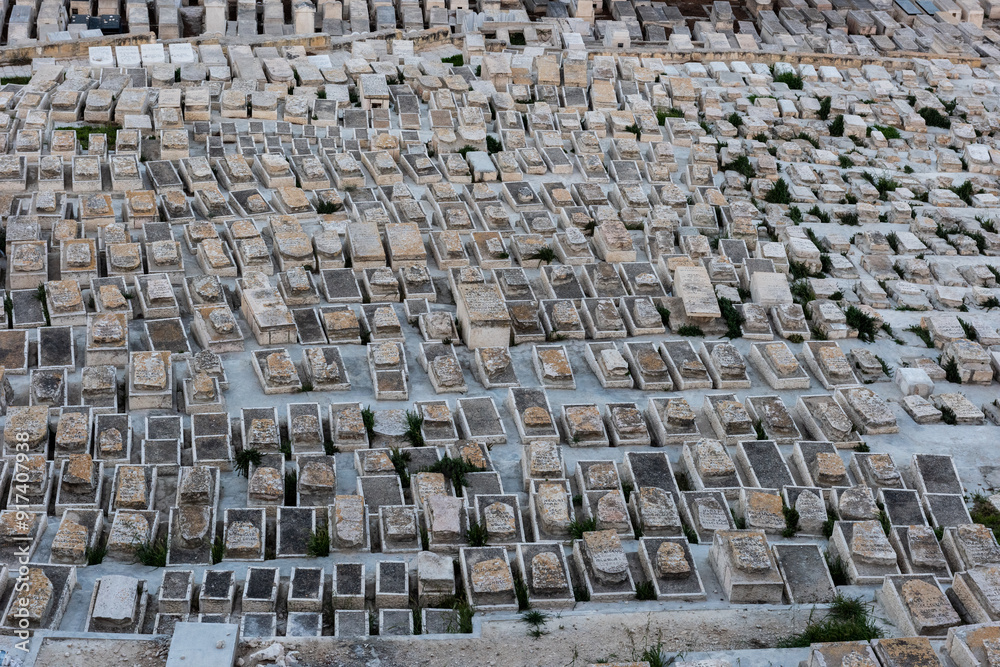 Rows of old graves in the Mount of Olives cemetery in Jerusalem, Israel. Rows of old graves in the Mount of Olives cemetery in Jerusalem, Israel.