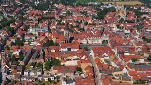 An Aerial panorama view around the old town of the city Naumburg in Burgenlandkreis on an early summer day in Germany. photo