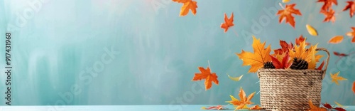 Autumn Leaves Falling From Basket Against Soft Blue Background