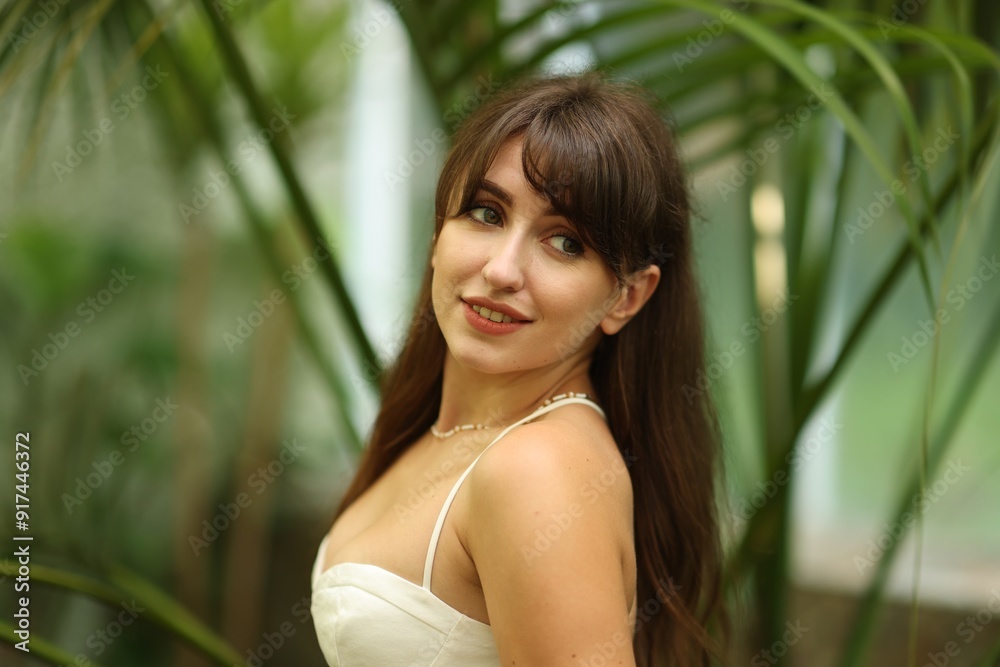 Portrait of smiling woman in tropical forest Portrait of smiling woman in tropical forest