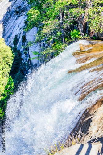 Vernal Falls, Yosemite National Park, the Misty Trail is a slippery, one-mile trail that winds through the spray of the falls. photo