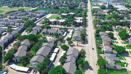 Tableau sur toile Subdivision mixed apartment complex and single-family houses neighborhood along