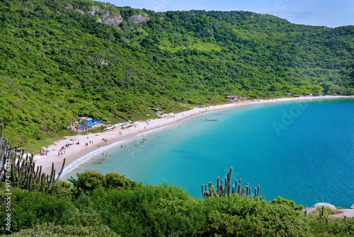 Forno Beach (Oven Beach), a paradisiacal and wild beach with clear waters surrounded by the Atlantic Forest. Arraial do Cabo, RJ, Brazil, 2019 photo