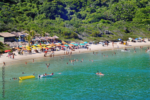 Forno Beach (Oven Beach), a paradisiacal and wild beach with clear waters surrounded by the Atlantic Forest. Arraial do Cabo, RJ, Brazil, 2019 photo