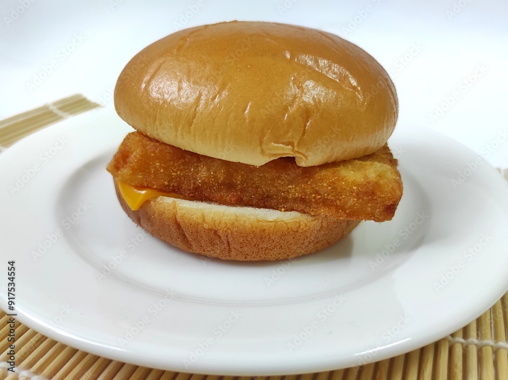 The Filet-O-Fish is a fish sandwich,isolated on white background. The Filet-O-Fish is a fish sandwich,isolated on white background.