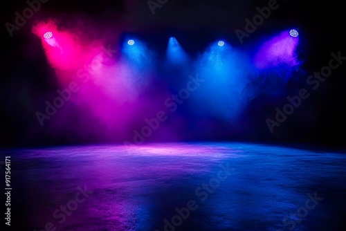 Empty Stage Illuminated by Blue and Purple Spotlights photo