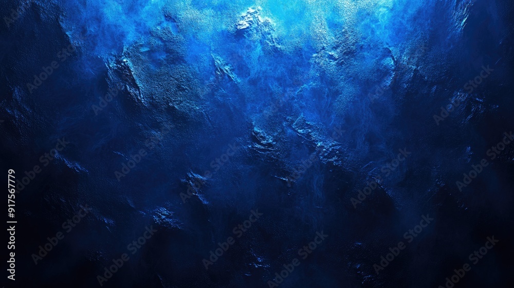 Fototapeta premium Textured dark blue background with subtle lighting effects and depth