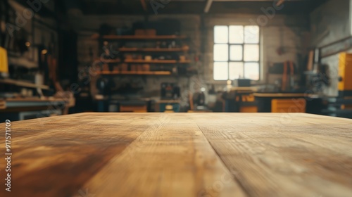 Empty table top. Blurred workshop interior background