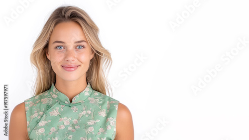 Caucasian female smile in traditional cheongsam dress isolated on gray