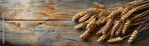 Rustic Harvest: Sheaf of Rye Ears on Wooden Table for Food Photography Background