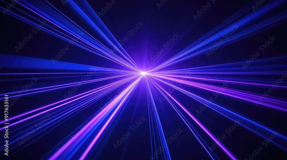 Blue and violet beams of bright laser light shining on black background Blue and violet beams of bright laser light shining on black background