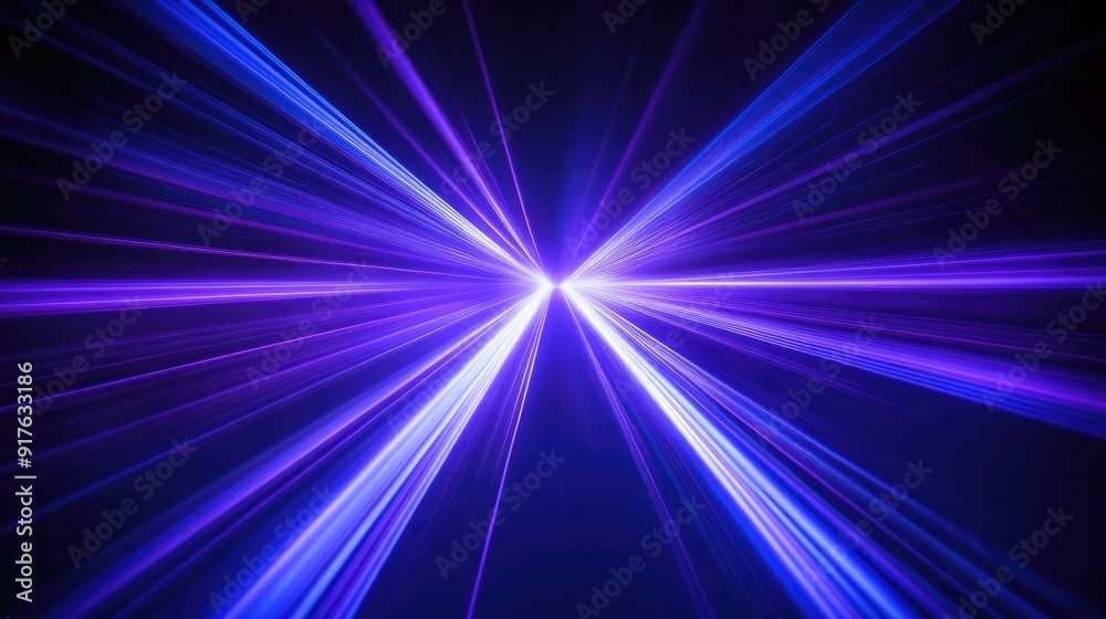 Blue and violet beams of bright laser light shining on black background Blue and violet beams of bright laser light shining on black background