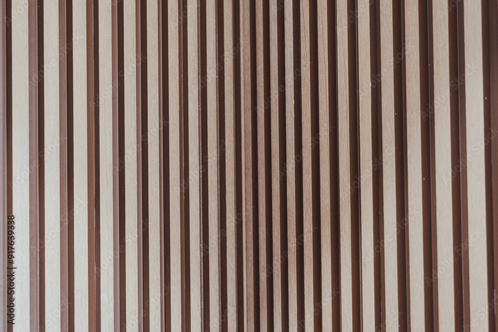 Obraz premium Stylish solid wooden battens wall. Vertical pattern design, backdrop interior design