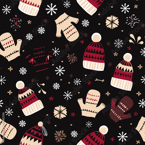 Seamless pattern with winter elements including hats mittens snowflakes and other winter decorations on a black background The repeating design is ideal for textile prints wrapping paper and holiday d