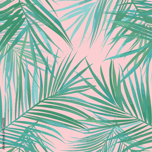 Tropical palm leaves on a pastel pink background creating a vibrant and exotic pattern