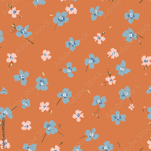 Seamless pattern with delicate blue and pink floral motifs on a warm orange background The pattern is perfect for creating feminine and summery designs for textiles wallpapers and packaging