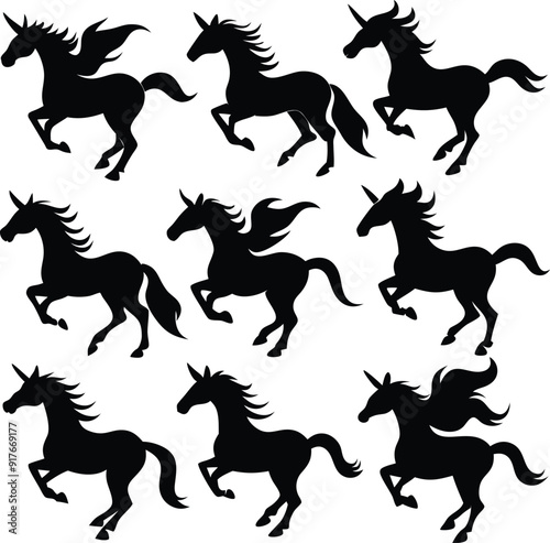 set of black silhouettes of unicorns jumping