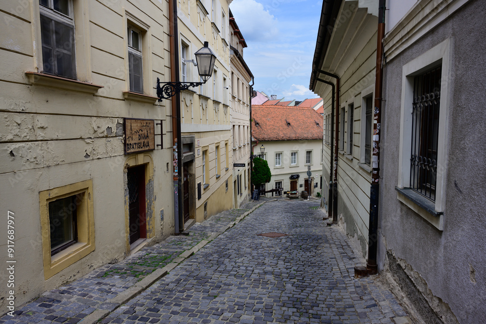 Bratislava, Slovakia - May 26 2024: Cobbled Old Town Beblaveho Street on the Castle Mountain. Bratislava, Slovakia - May 26 2024: Cobbled Old Town Beblaveho Street on the Castle Mountain.