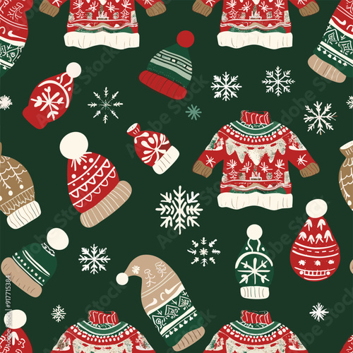 Seamless pattern with Christmas sweaters and hats on dark green background