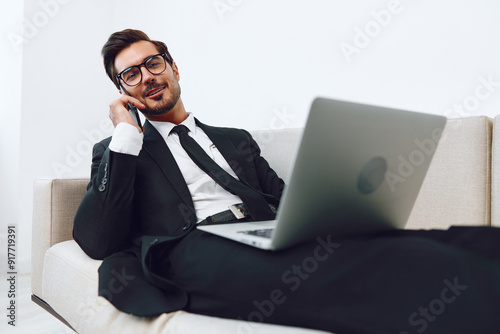 Man computer laptop businessman phone talk office
