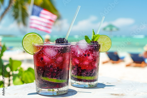 Tonic blackberry refresher with lime on a beachside table photo