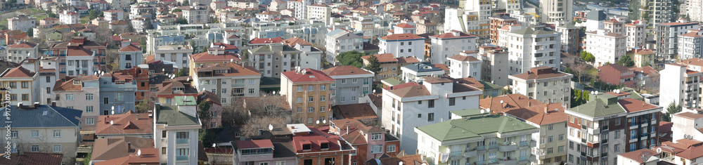 Aerial View of a Diverse Urban Landscape Featuring RedTiled Roofs and Tall HighRise Buildings Aerial View of a Diverse Urban Landscape Featuring RedTiled Roofs and Tall HighRise Buildings