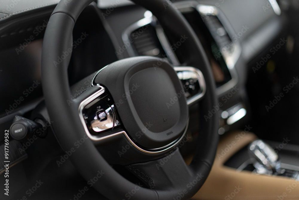Car interior with steering wheel and control elements. Car interior with steering wheel and control elements.