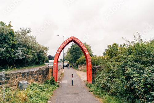 Newcastle upon Tyne, UK, July 4th 2024. Cyclists heading down Hadrian's Cycleway, shared bike path towards Wallsend photo