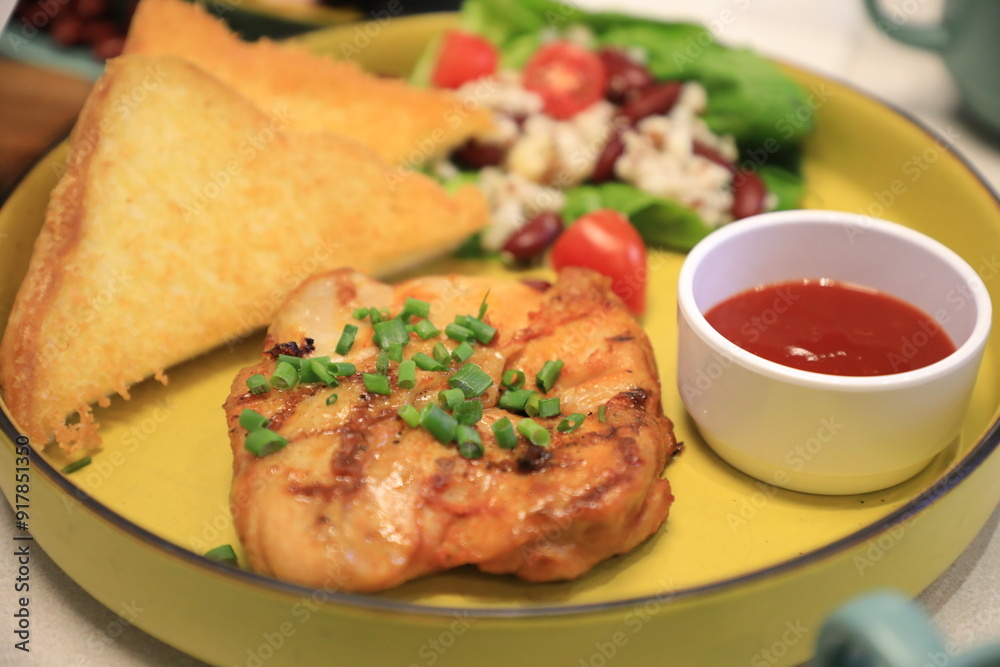 Grilled chicken breast served with crispy French fries, a fresh salad, and a side of tangy barbecue sauce is perfect for food lovers and culinary enthusiasts. Grilled chicken breast served with crispy French fries, a fresh salad, and a side of tangy barbecue sauce is perfect for food lovers and culinary enthusiasts.
